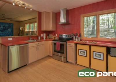 View of kitchen layout, with rolling under counter storage units