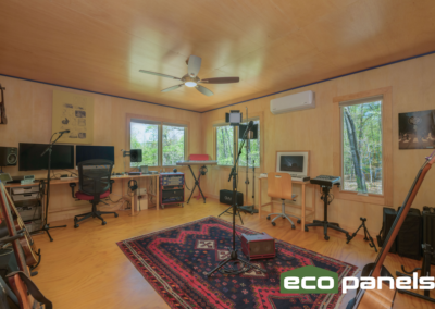 Music studio with lots of open space for performers. Notice the mini split AC for temperature control.